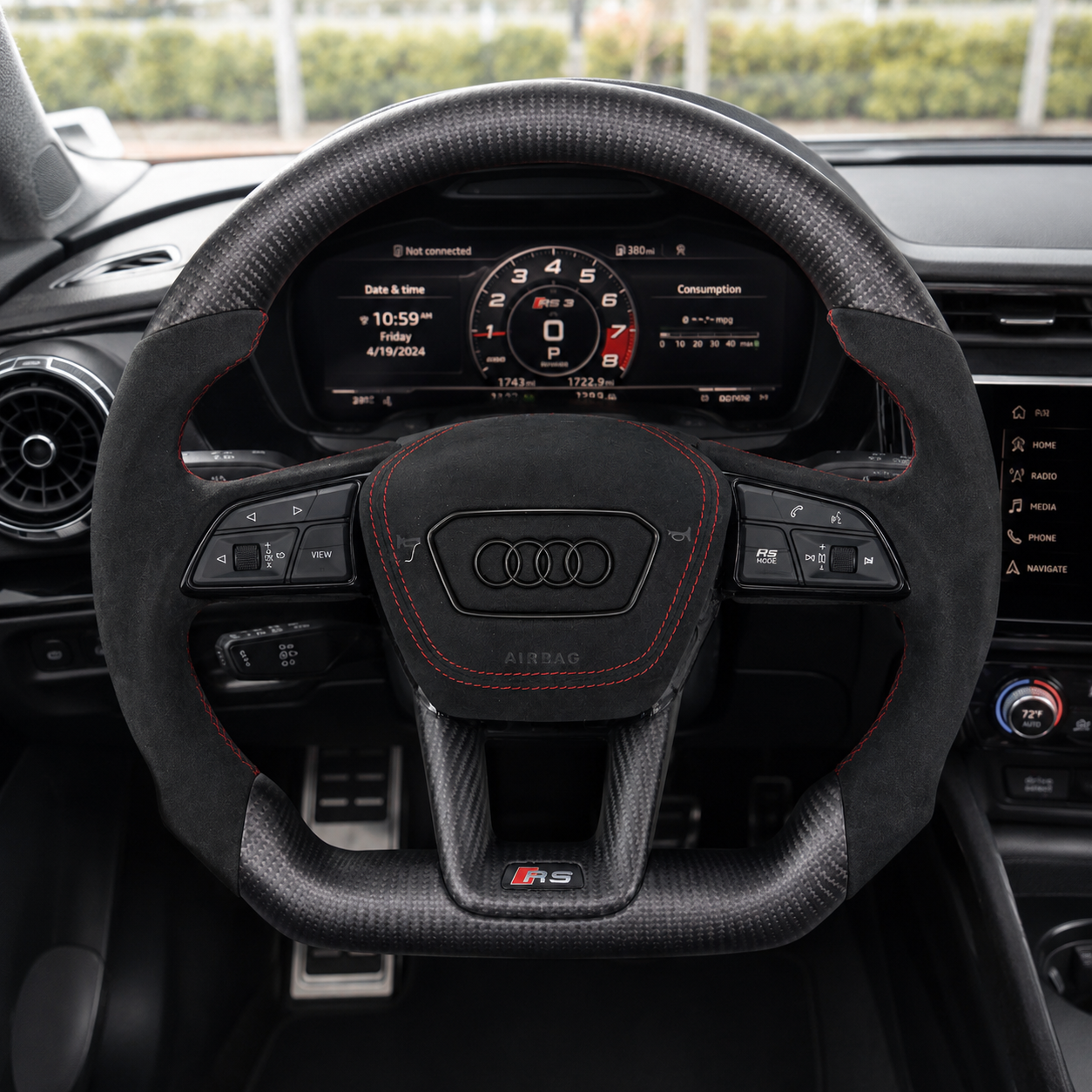 Front interior view of Audi matte carbon fiber sport steering wheel with Alcantara airbag cover and red stitching fits A3 2021 to 2025 A4 A4L 2020 to 2025