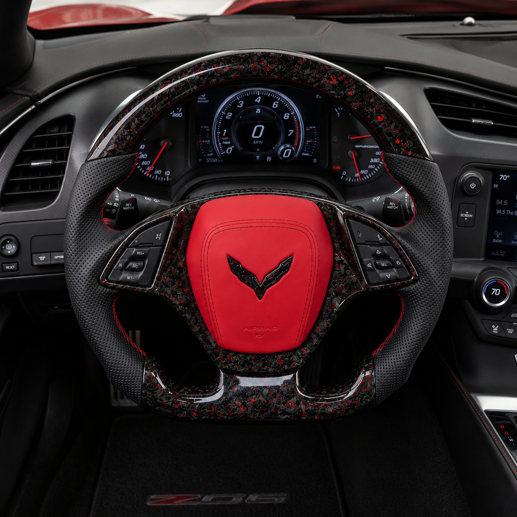 Chevrolet Corvette C7 custom steering wheel cockpit front view with red airbag cover black forged carbon red flakes and black perforated leather grips