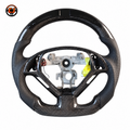 Custom Infiniti G37 carbon fiber steering wheel frame featuring flat bottom design perforated leather grips and OEM control openings by CJ Mod Garage
