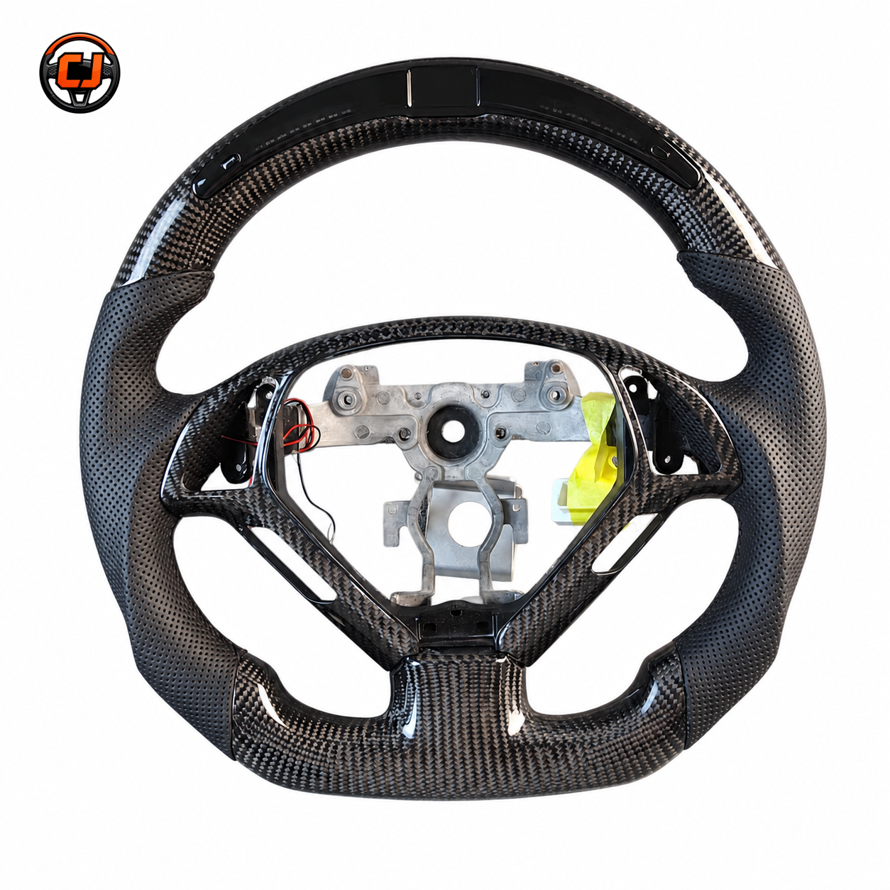 Custom Infiniti G37 carbon fiber steering wheel frame featuring flat bottom design perforated leather grips and OEM control openings by CJ Mod Garage