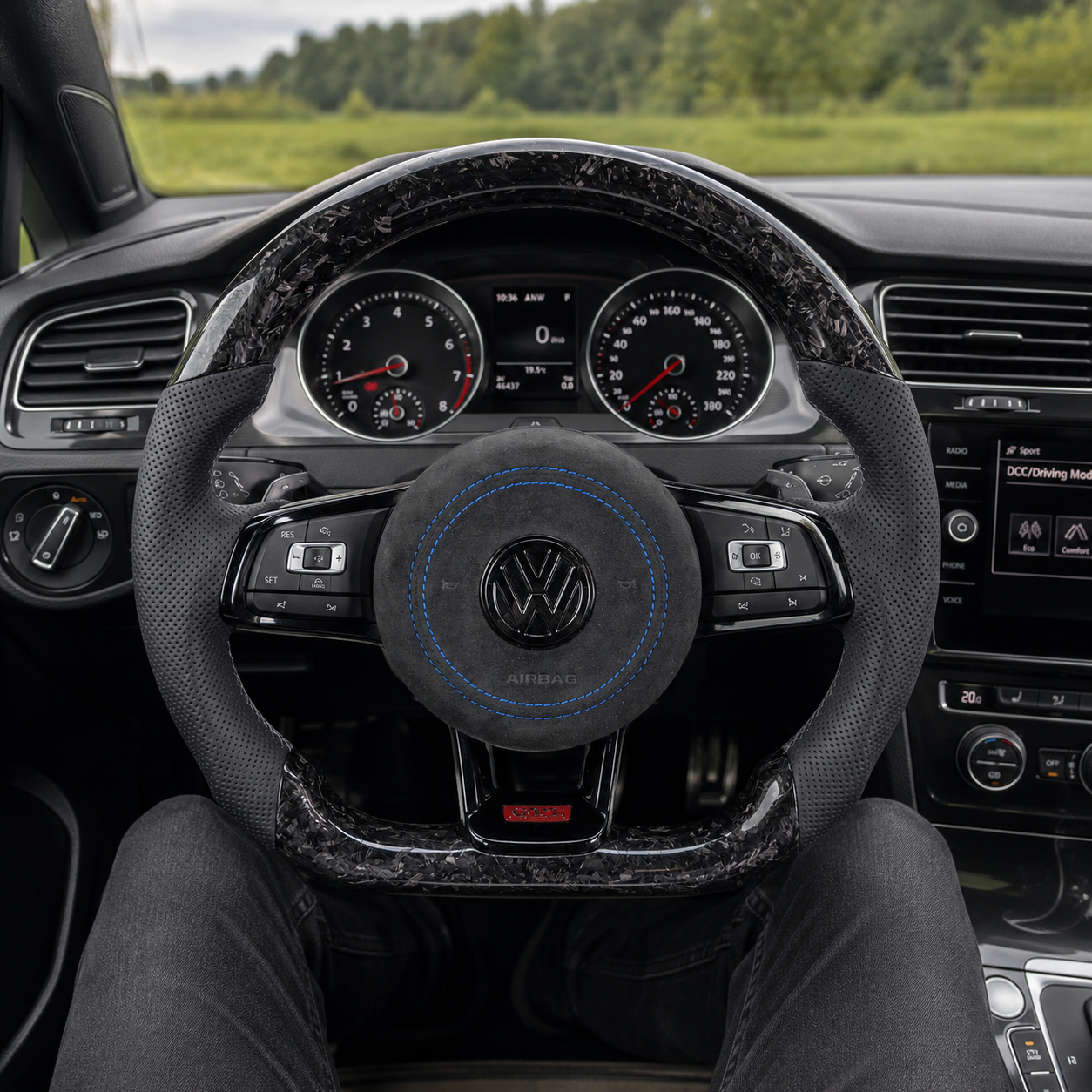 Forged carbon GTI steering wheel shown inside the cabin for MK7 GTI Golf 6 7 7 5 R R Line CC Polo Passat B8 by CJ Mod Garage