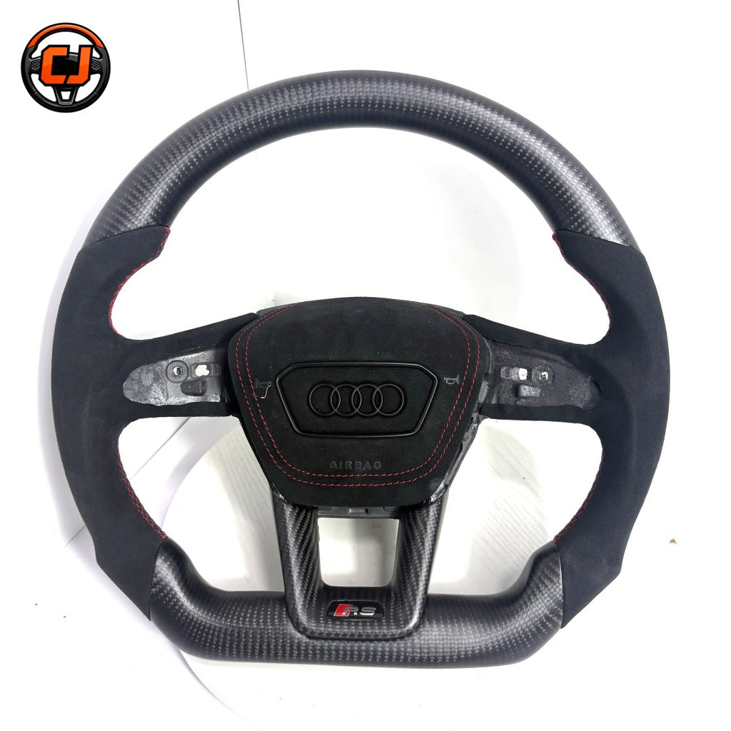 matte carbon fiber steering wheel, suede audi steering wheel, audi flat bottom steering wheel, audi q3 steering wheel upgrade, audi q5 carbon fiber wheel, audi q7 suede steering wheel, audi q8 flat bottom wheel, audi a3 custom steering wheel, audi a4 carbon fiber steering wheel, audi a6 suede sport wheel, audi a7 performance steering wheel, red stripe audi steering wheel, luxury audi interior upgrade, performance flat bottom steering wheel