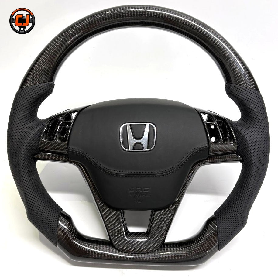Custom Honda CR-V carbon fiber steering wheel with integrated airbag cover perforated leather grips and premium finish by CJ Mod Garage