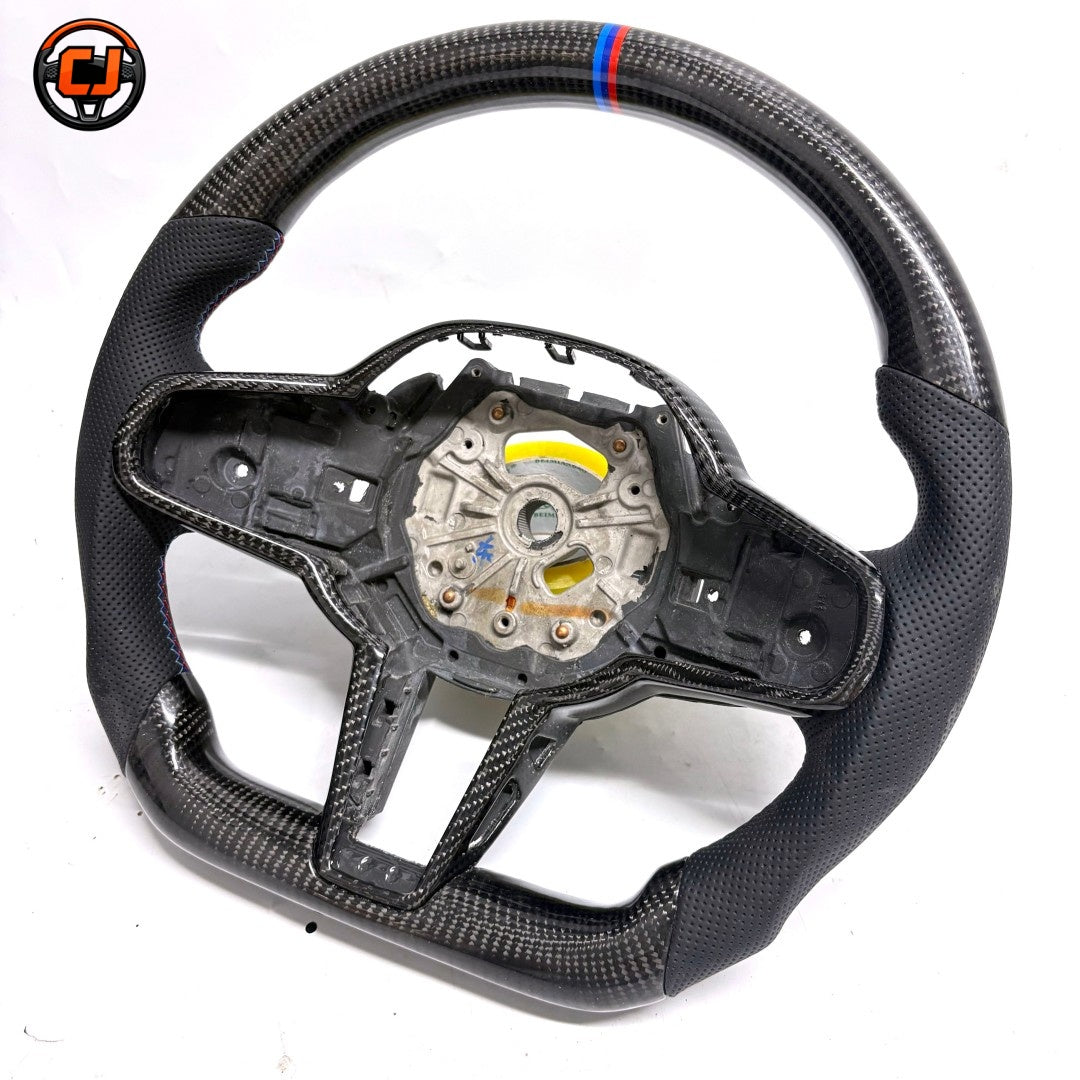 BMW X5 G05 2019-2025 carbon fiber flat-bottom wheel frame with black perforated leather by CJ Mod Garage