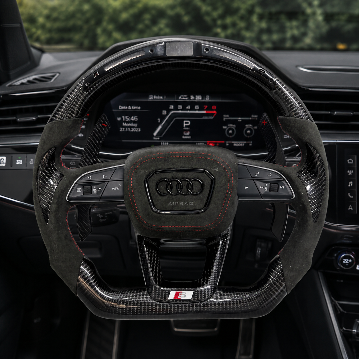 Installed Audi LED carbon fiber custom steering wheel with suede grips and red stitching compatible with A3 2021 to 2025 A4 A4L 2017 to 2025 and A6 A6L C8 2019 to 2025