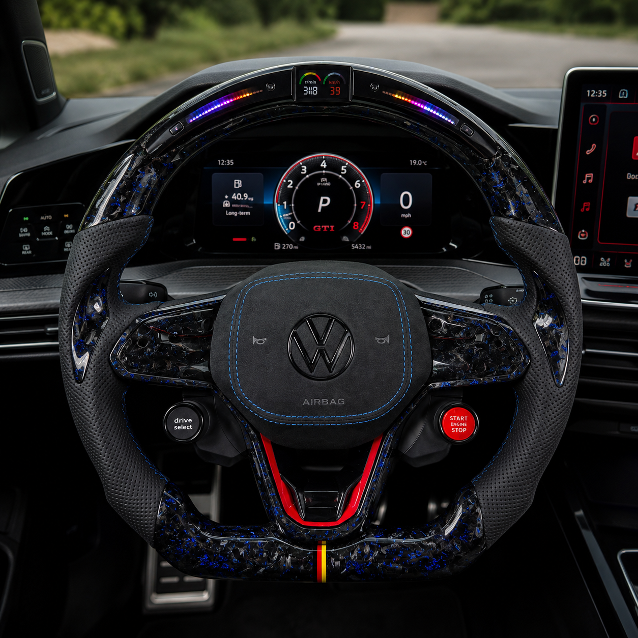 LED performance steering wheel installed in GTI style cockpit with blue forged carbon accents Alcantara grips and racing inspired details for Golf 8 MK8 Passat Touareg Tiguan Polo GTD MK7 MK6 R Line CC Jetta by CJ Mod Garage