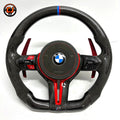 BMW F30 F32 F80 carbon fiber steering wheel with red sport accents, Alcantara side grips, and carbon paddle shifters