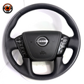 Nissan Patrol Y62 custom steering wheel with carbon fiber outer ring black leather grip factory button compatibility and refined craftsmanship by CJ Mod Garage