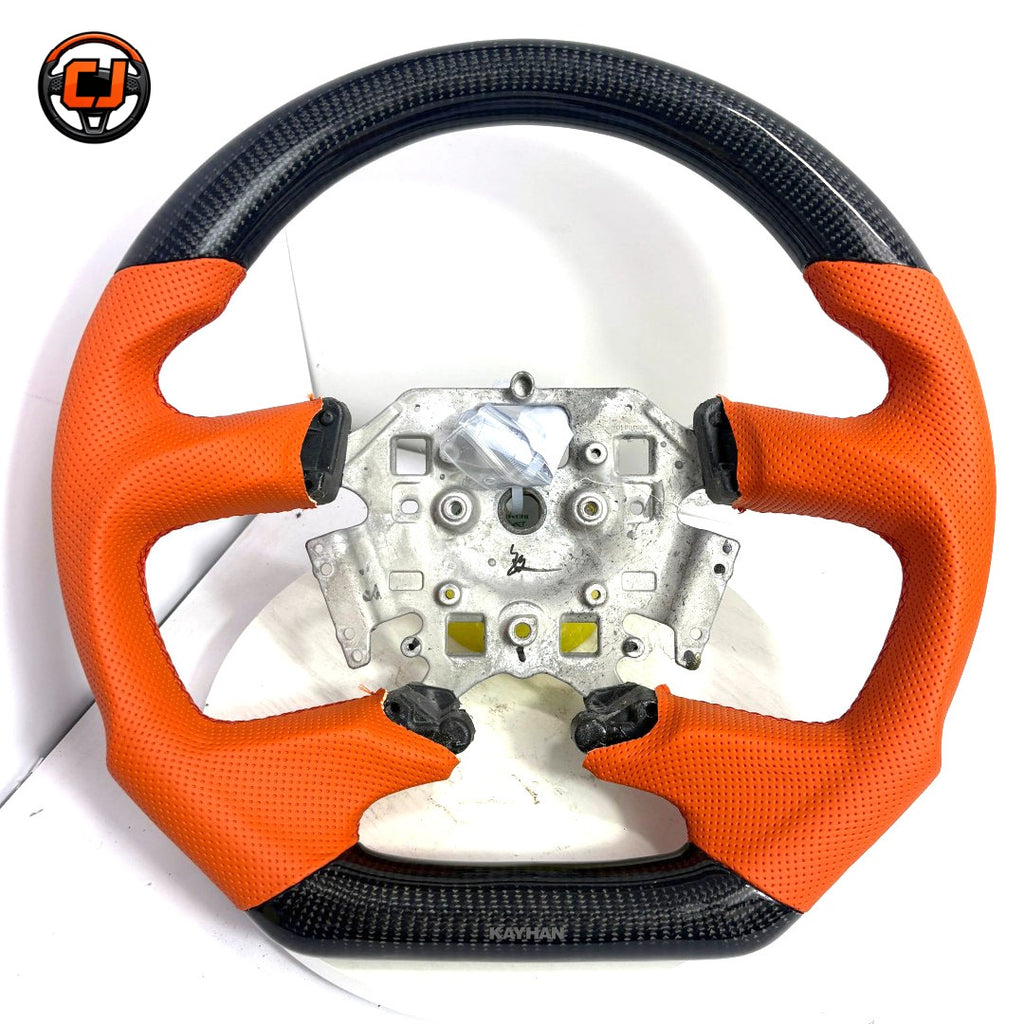Ford Falcon FG XR6 XR8 flat-bottom steering wheel in carbon fiber and orange perforated leather by CJ Mod Garage