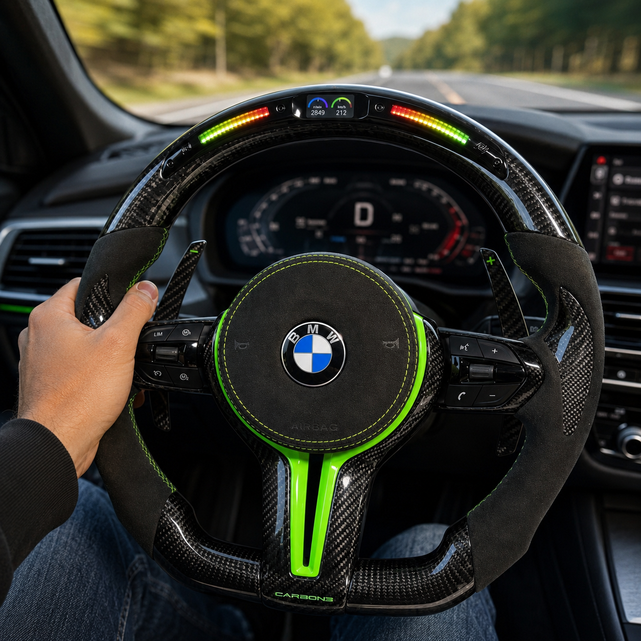 BMW F Series E90 E92 E93 LED carbon fiber steering wheel installed in vehicle interior with Alcantara grips and green sport accents