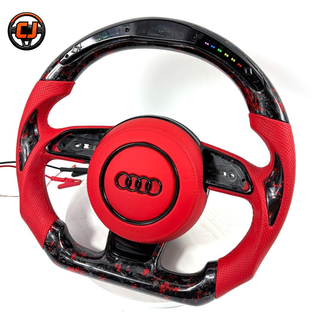 Audi B8 forged carbon red flake LED steering wheel - angled view showing LED shift bar active and red perforated leather grips