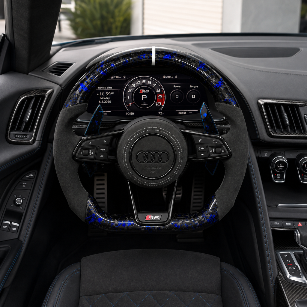 Front cockpit installation of Audi custom flat bottom steering wheel with blue forged carbon accents Alcantara grips round airbag cover and extended paddle shifters for Audi A1 A3 A4 A5 A6 A7 C6 C7 S3 S4 S5 S7 Q3 Q5 Q7 SQ5 RS RS3 RS5 RS6 B8 B9 8P 8V R8 TT