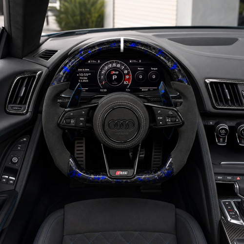 Front cockpit installation of Audi custom flat bottom steering wheel with blue forged carbon accents Alcantara grips round airbag cover and extended paddle shifters for Audi A1 A3 A4 A5 A6 A7 C6 C7 S3 S4 S5 S7 Q3 Q5 Q7 SQ5 RS RS3 RS5 RS6 B8 B9 8P 8V R8 TT