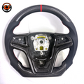 Studio front view of custom Chevrolet Camaro carbon fiber steering wheel with black perforated leather grips red stitching red center stripe flat bottom design and exposed center mounting structure