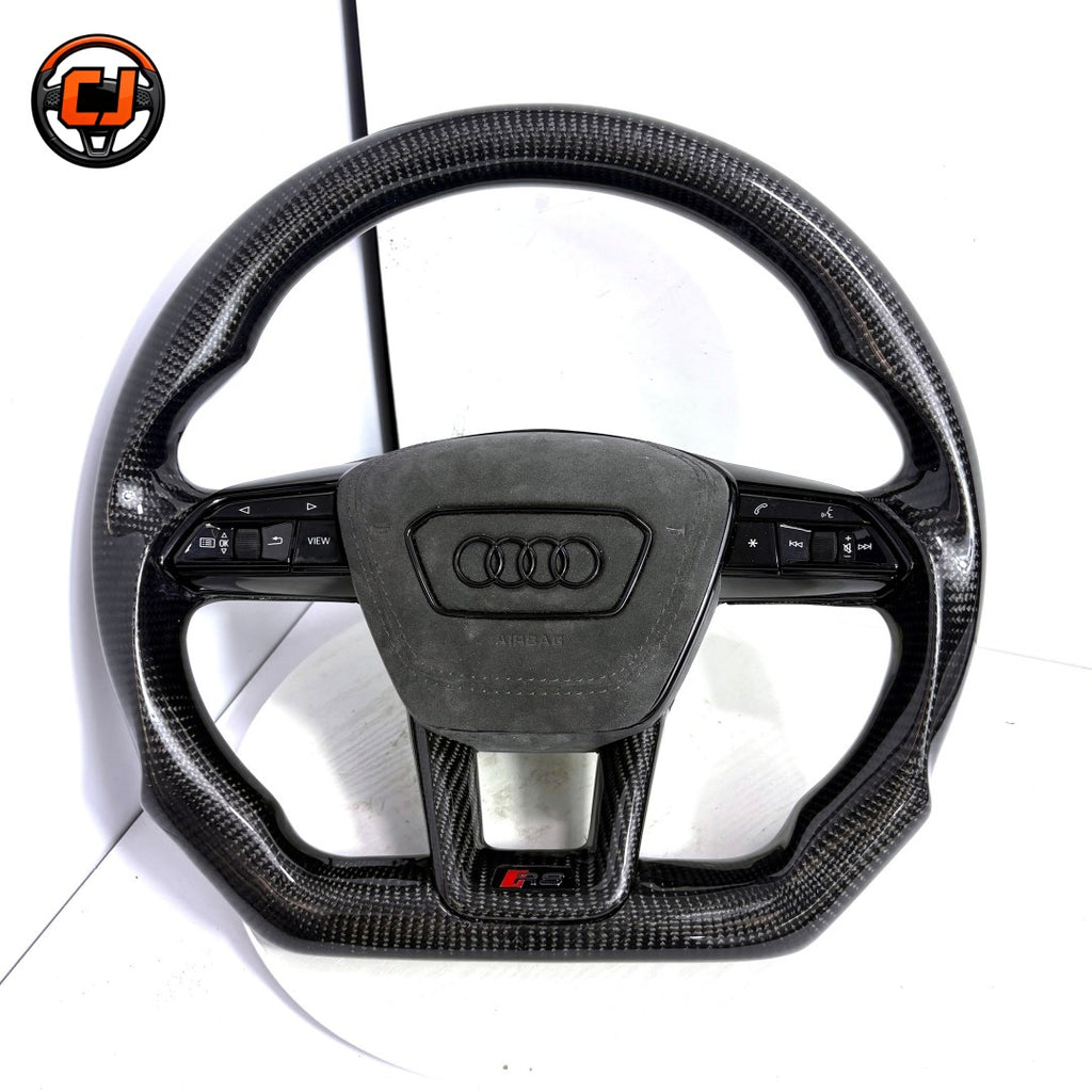 audi rs steering wheel, audi carbon fiber steering wheel, matte carbon fiber steering wheel, audi rs performance wheel, audi black steering wheel, audi sport steering wheel, audi custom steering wheel, carbon fiber car steering wheel, audi rs interior upgrade, audi steering wheel upgrade, audi flat bottom steering wheel, luxury car steering wheel audi, audi rs mod accessories, performance steering wheel audi, audi carbon fiber upgrade