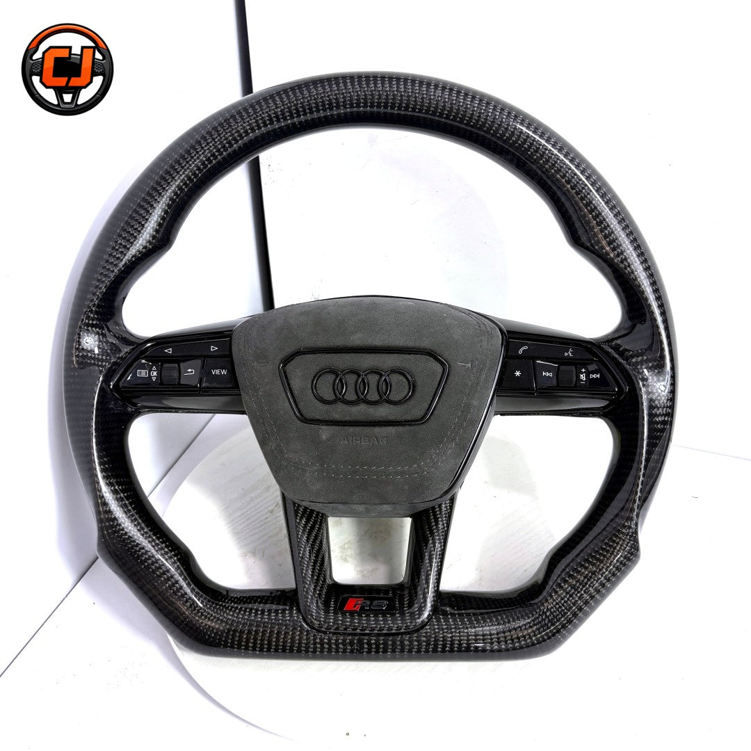 audi rs steering wheel, audi carbon fiber steering wheel, matte carbon fiber steering wheel, audi rs performance wheel, audi black steering wheel, audi sport steering wheel, audi custom steering wheel, carbon fiber car steering wheel, audi rs interior upgrade, audi steering wheel upgrade, audi flat bottom steering wheel, luxury car steering wheel audi, audi rs mod accessories, performance steering wheel audi, audi carbon fiber upgrade