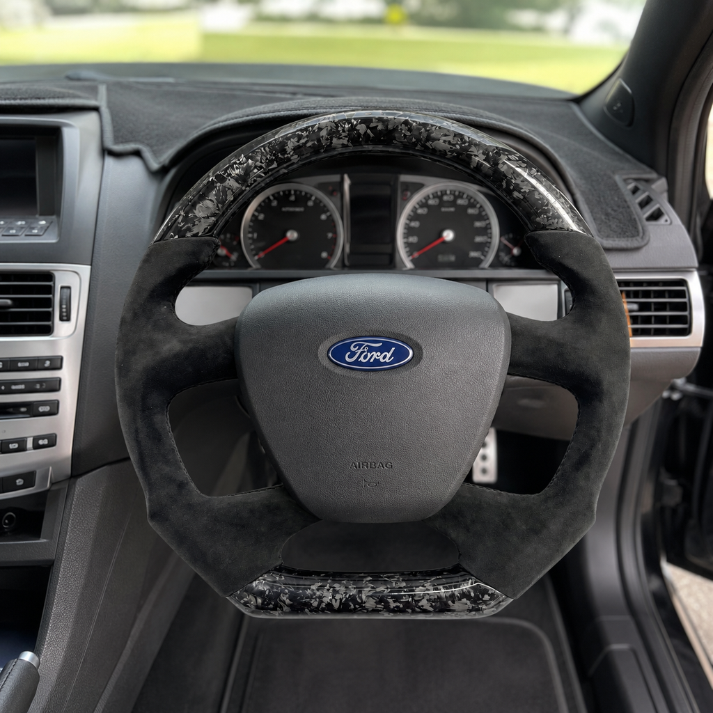 Ford Falcon FG XR XR6 XR8 custom steering wheel installed in cockpit with forged carbon fiber and black Alcantara by CJ Mod Garage