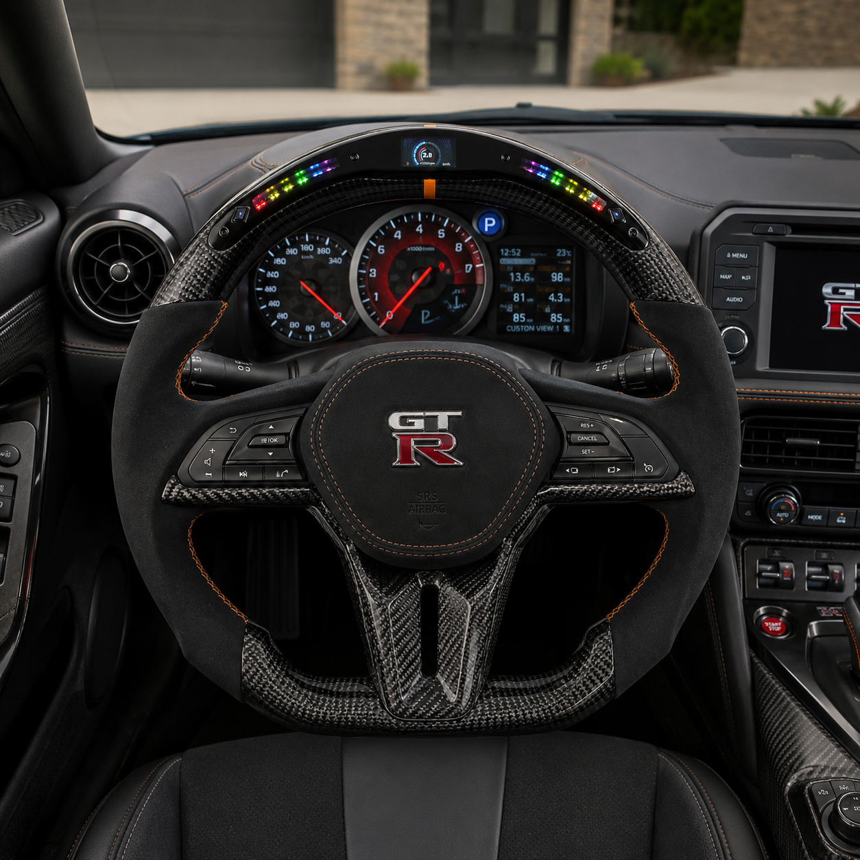 Nissan GT R R35 custom carbon fiber steering wheel with LED shift lights Alcantara grips digital display and orange stitching by CJ Mod Garage