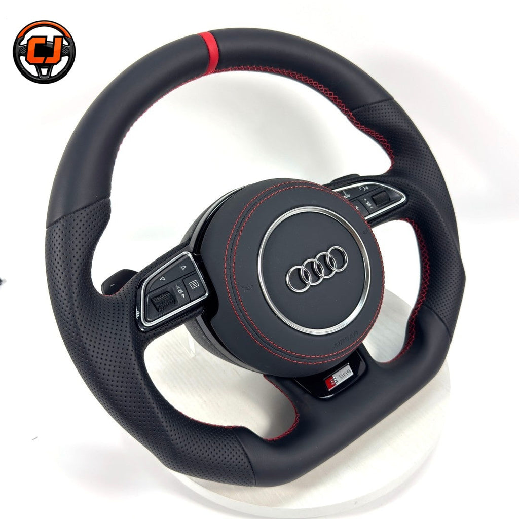 Audi B8 S-line smooth perforated leather steering wheel - angled view showing red center stripe, red stitching, and S-line badge