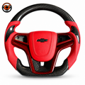 Custom Chevrolet Camaro carbon fiber steering wheel with red perforated leather grips red leather airbag cover red carbon style trim and flat bottom design