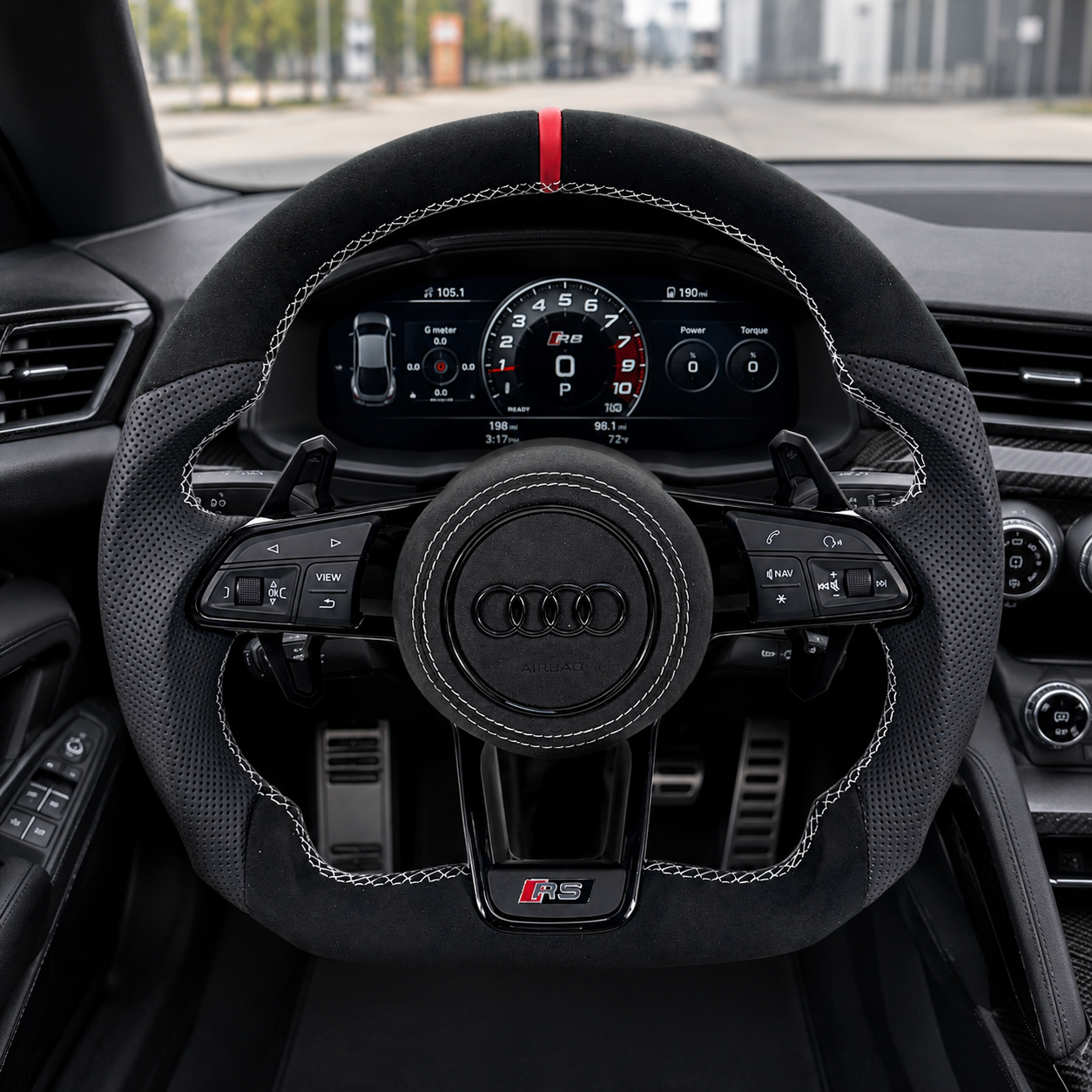 Driver view of Audi custom flat bottom steering wheel installed in an R8 interior with black suede perforated grips red top stripe white contrast stitching round airbag controls and shift paddles for Audi A1 A3 A4 A5 A6 A7 C6 C7 S3 S4 S5 S7 Q3 Q5 Q7 SQ5 RS RS3 RS5 RS6 B8 B9 8P 8V R8 TT