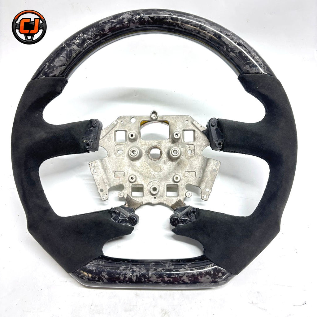 Ford Falcon FG XR XR6 XR8 flat-bottom steering wheel on white background in forged carbon fiber and black Alcantara by CJ Mod Garage
