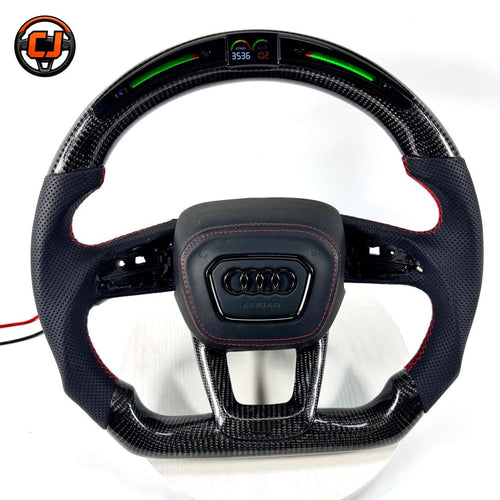 audi steering wheel, carbon fiber steering wheel, audi led steering wheel, audi sport steering wheel, audi custom steering wheel, audi performance wheel, led display steering wheel, audi flat bottom wheel, audi rs steering wheel, audi interior upgrade, carbon fiber audi wheel, audi racing steering wheel, audi red stitch wheel, luxury car steering wheel, aftermarket audi steering wheel