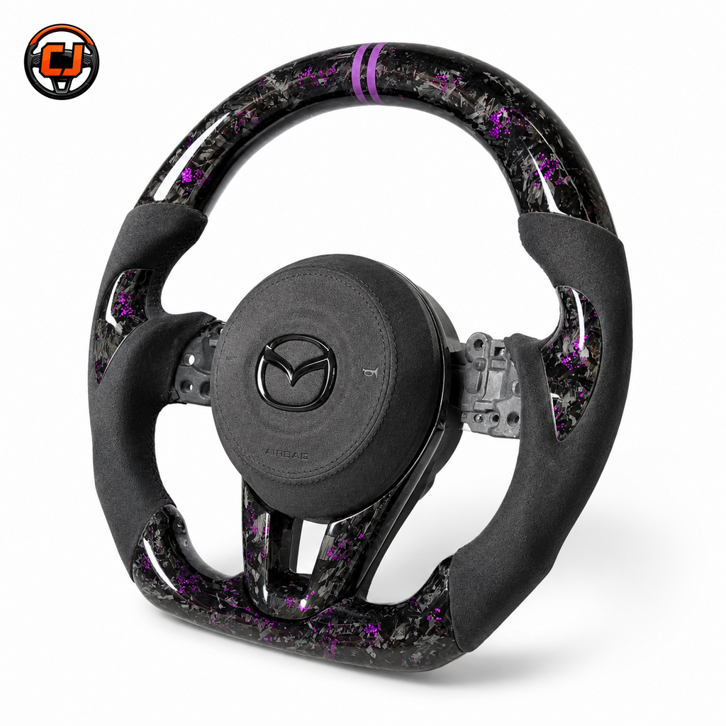 Custom Mazda steering wheel with purple forged carbon finish black suede side grips dual purple center stripe and airbag cover