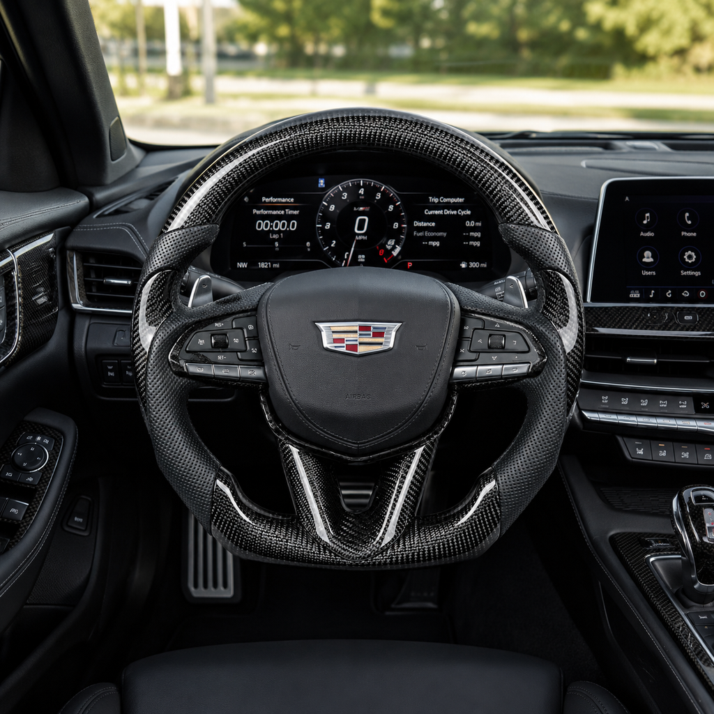 Cadillac CT4 CT5 carbon fiber steering wheel mounted in cockpit with perforated leather grips by CJ Mod Garage