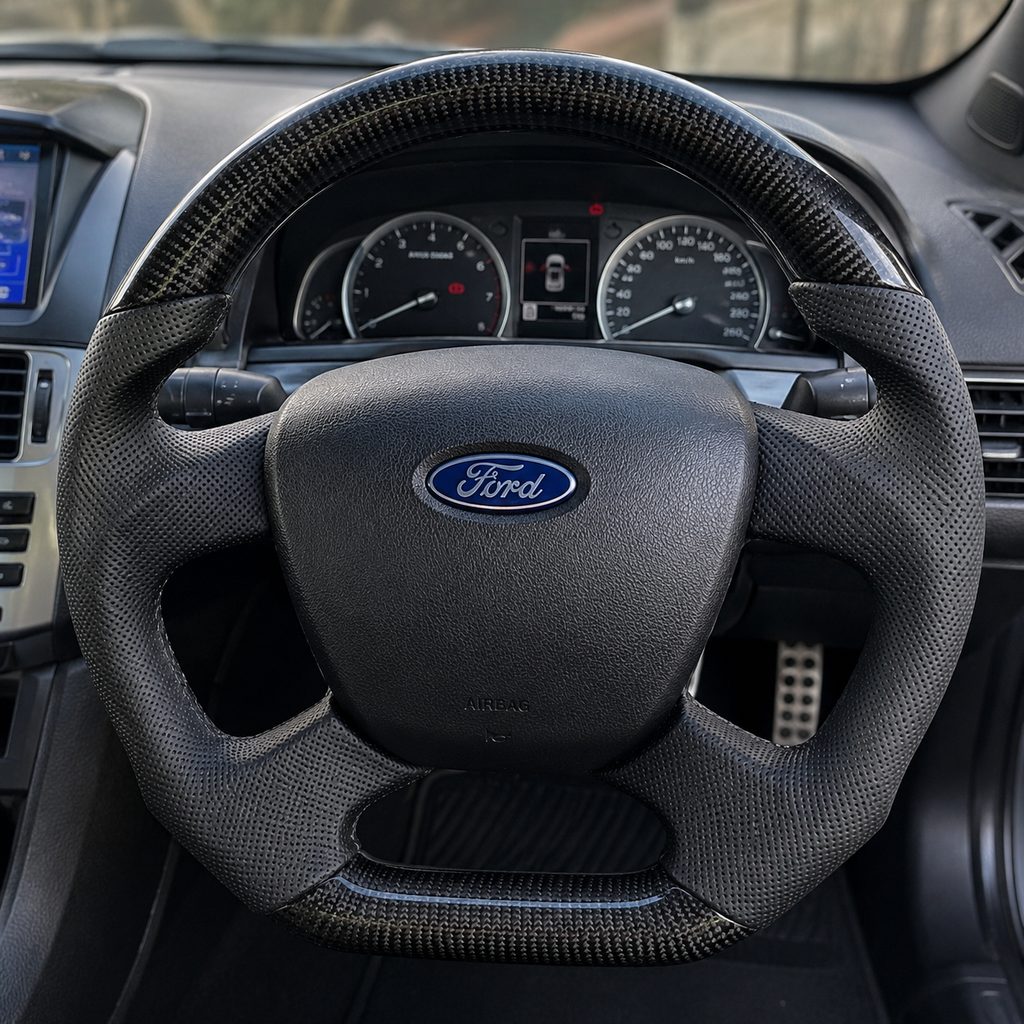 2008-2016 Ford Falcon FG XR XR6 XR8 cockpit steering wheel with gloss carbon fiber and black perforated leather by CJ Mod Garage