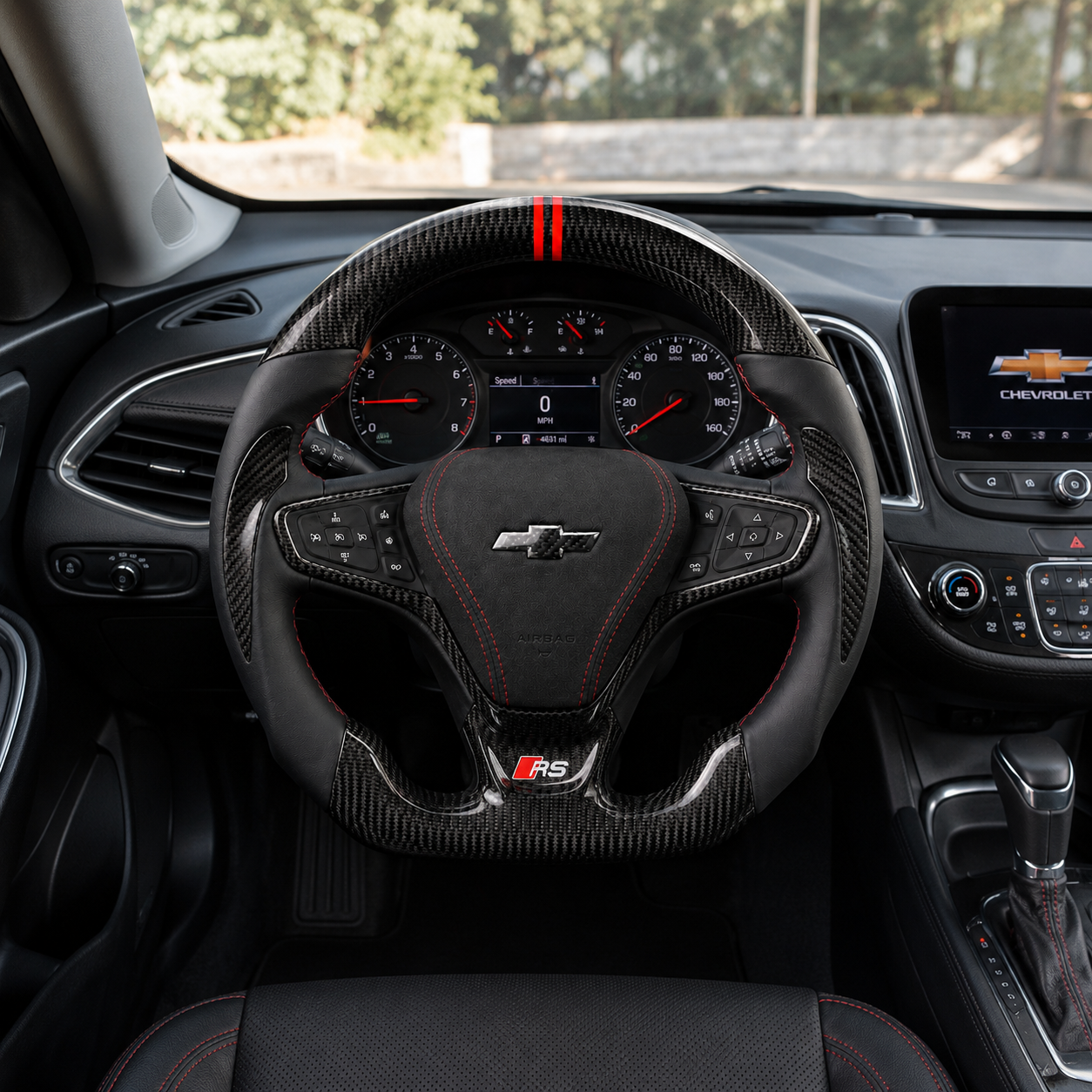 Custom Chevrolet Malibu Cruze steering wheel installed in vehicle interior with glossy carbon fiber trim black grip red stitching and double red top stripe