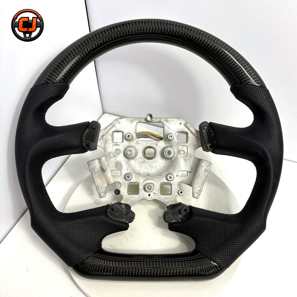 Ford Falcon FG XR6 XR8 flat-bottom steering wheel product photo with carbon fiber and perforated leather by CJ Mod Garage