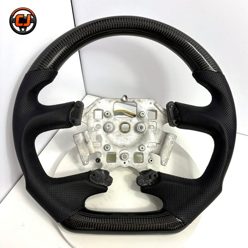 Ford Falcon FG XR6 XR8 flat-bottom steering wheel product photo with carbon fiber and perforated leather by CJ Mod Garage