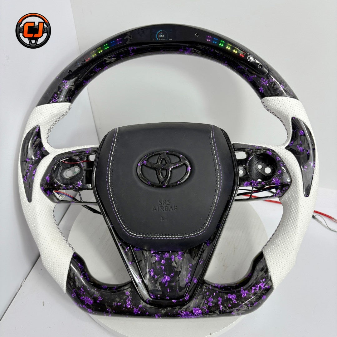 Toyota Avalon RAV4 Highlander compatible forged carbon steering wheel with purple flake finish, white perforated leather and integrated LED shift indicators by CJ Mod Garage