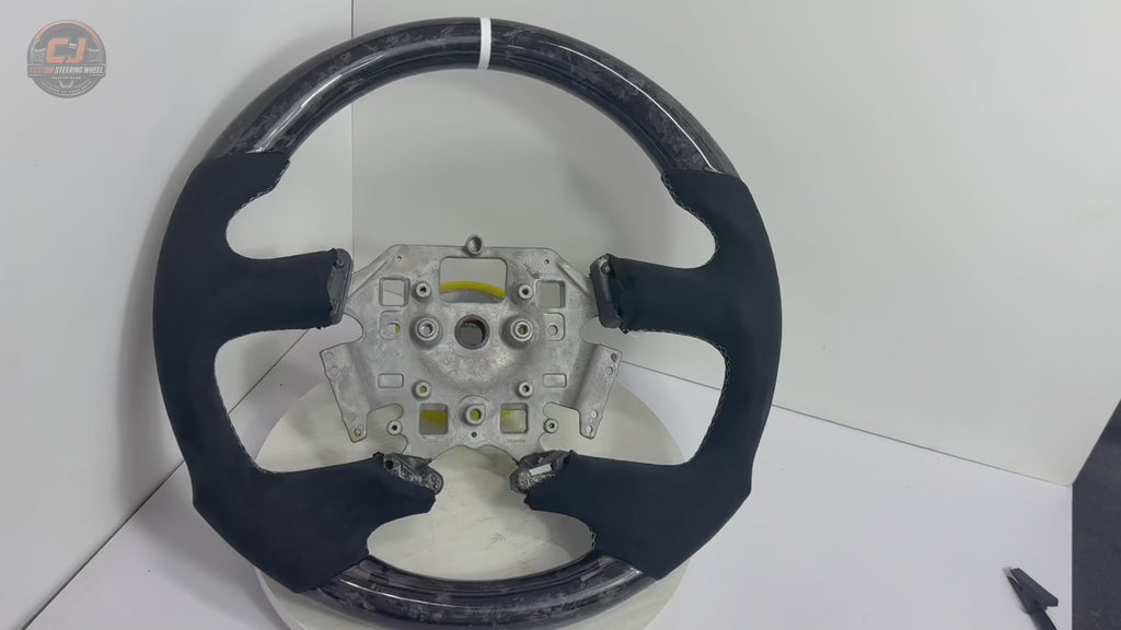 Ford Falcon FG XR XR6 XR8 forged carbon and black Alcantara custom steering wheel product video on white background by CJ Mod Garage