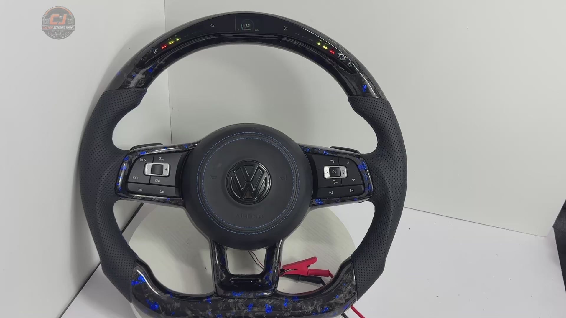 White background product video showing VW Golf GTI blue flake LED steering wheel for MK7 GTI Golf 6 7 7 5 R R Line CC Polo Passat B8 CJ Mod Garage