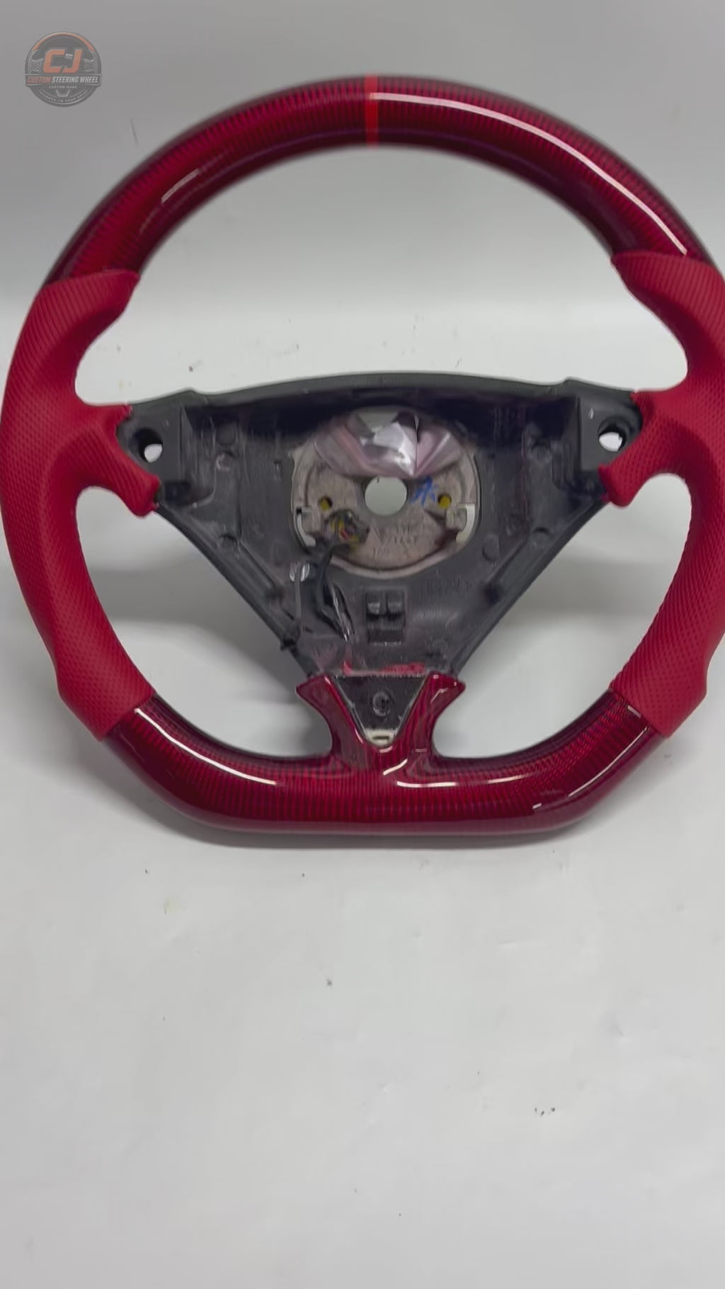 Porsche Cayenne 955 957 Carbon Fiber Steering Wheel Video Showcasing Red Carbon Fiber Construction Red Perforated Leather Grip Areas Custom Sport Styling for 2003 2010 Models CJ Mod Garage