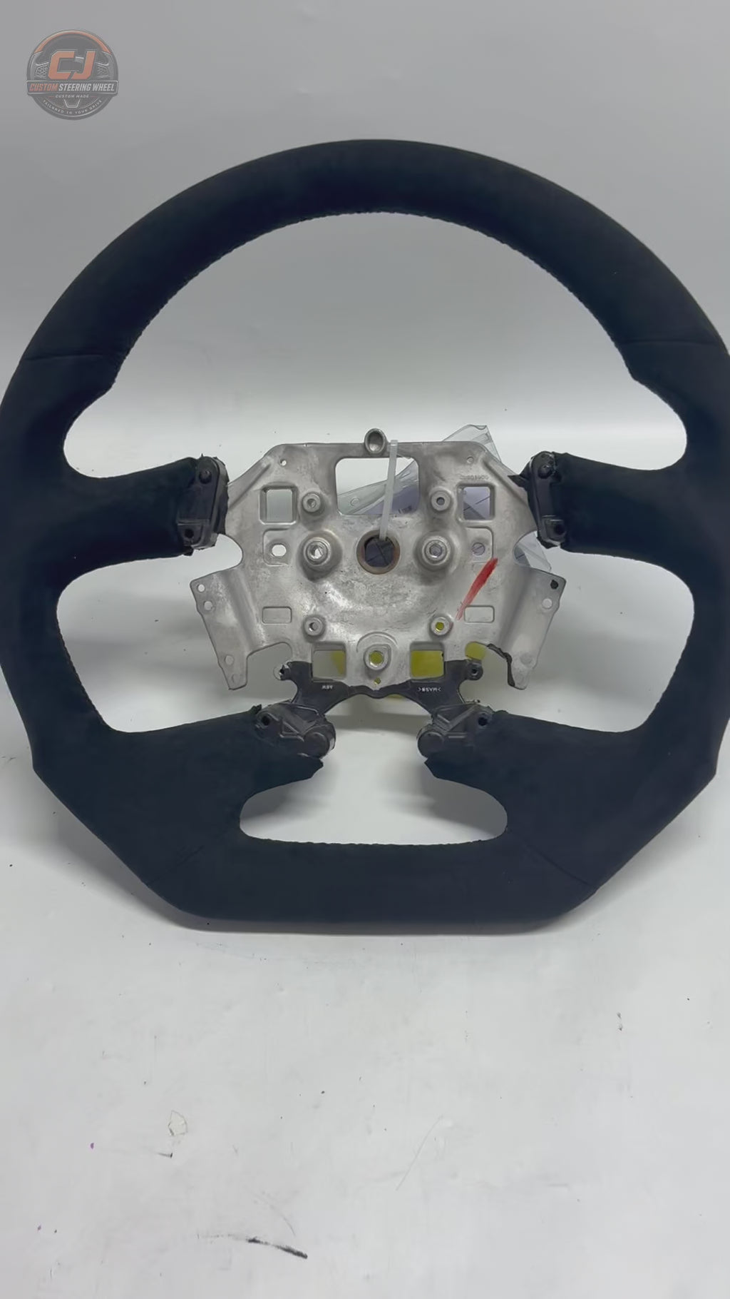White background product video of Ford Falcon FG XR XR6 XR8 custom steering wheel in full black suede style finish by CJ Mod Garage