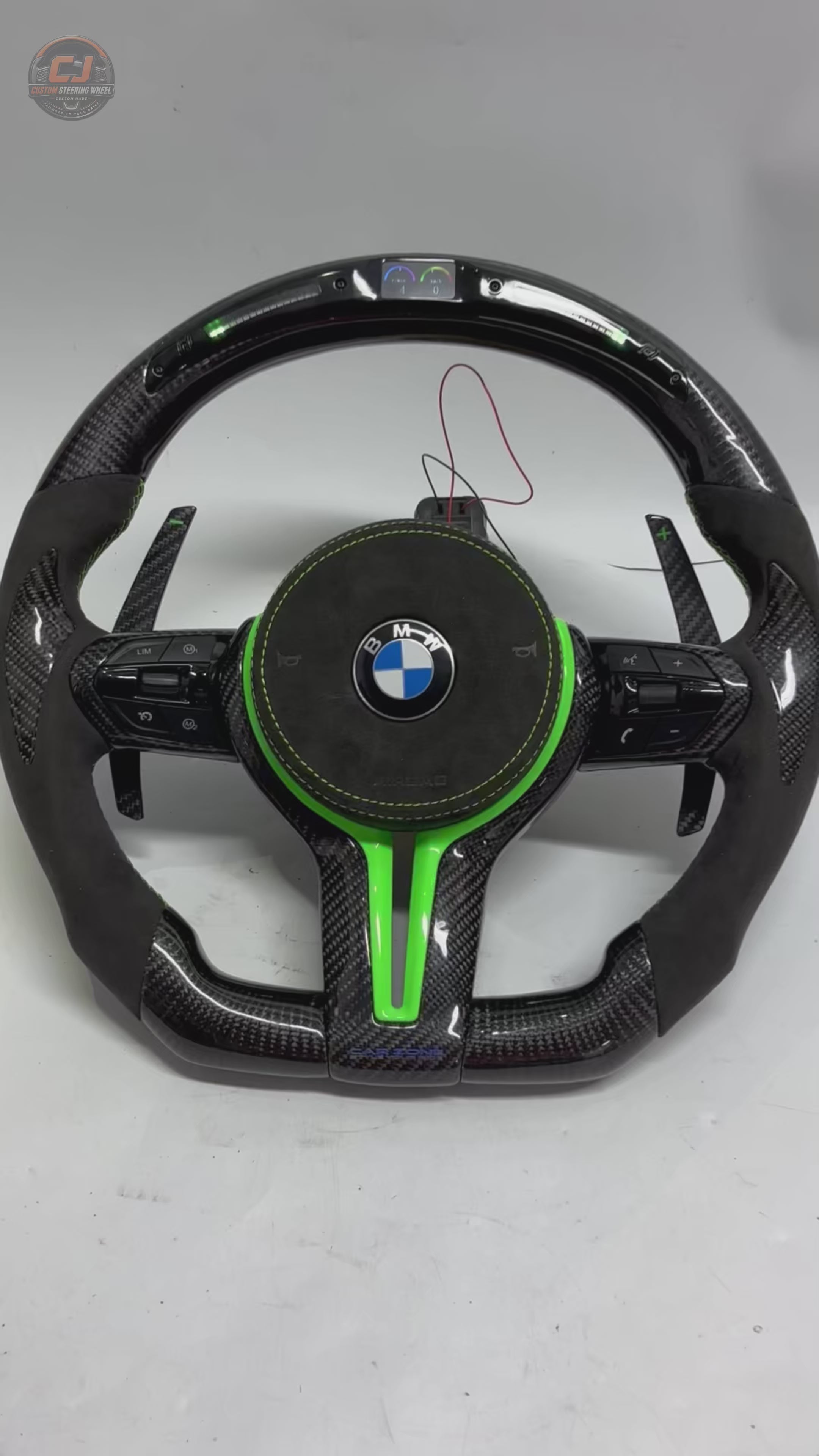 BMW F Series E90 E92 E93 LED carbon fiber steering wheel with green center stripe and Alcantara side grips