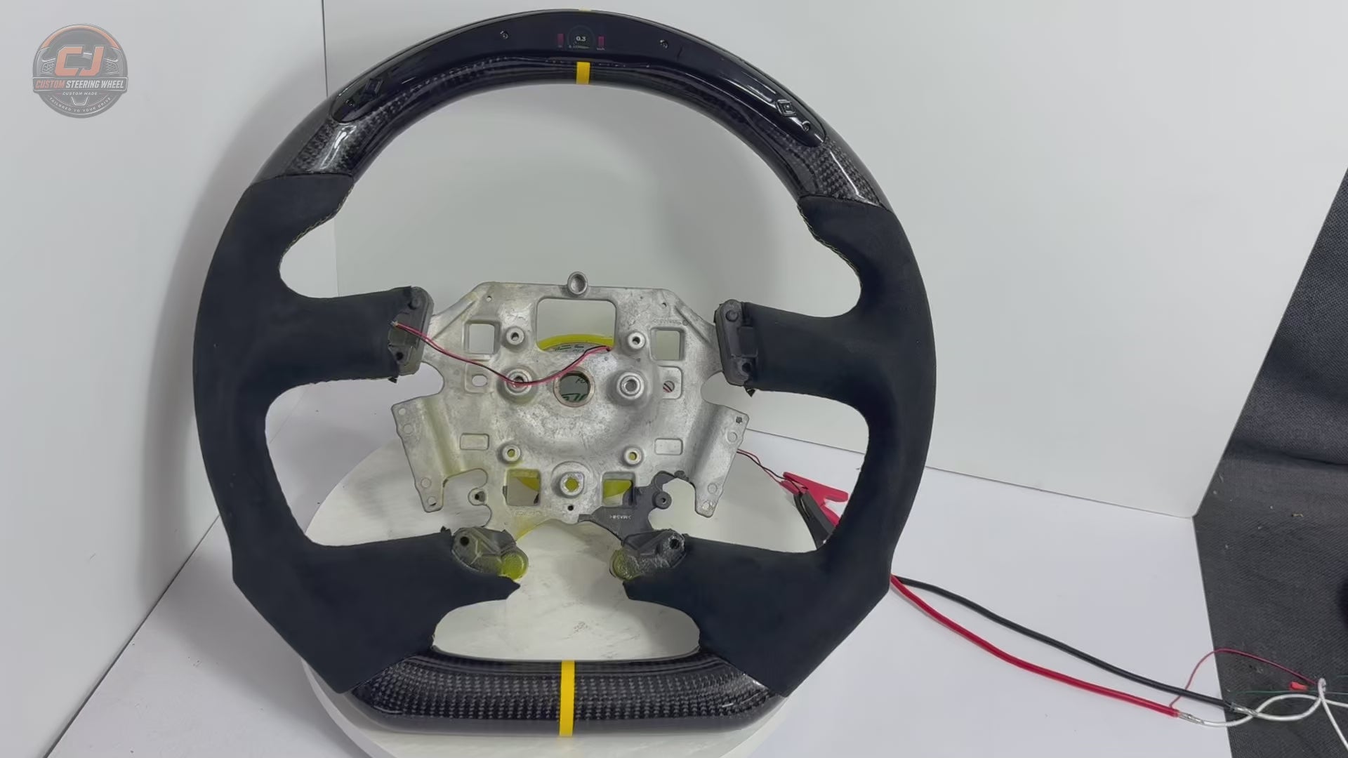 Ford Falcon FG XR6 XR8 carbon fiber Alcantara LED steering wheel white background product video by CJ Mod Garage