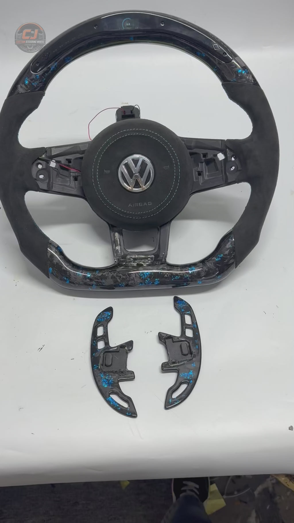 Volkswagen Golf GTI Mk7 white studio video featuring blue forged carbon LED wheel airbag cover and texture CJ Mod Garage