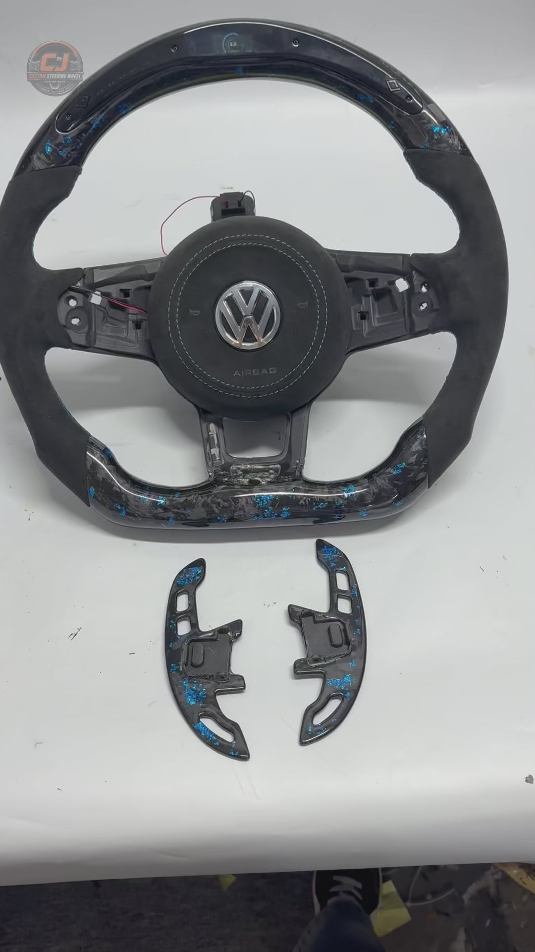 Volkswagen Golf GTI Mk7 white studio video featuring blue forged carbon LED wheel airbag cover and texture CJ Mod Garage