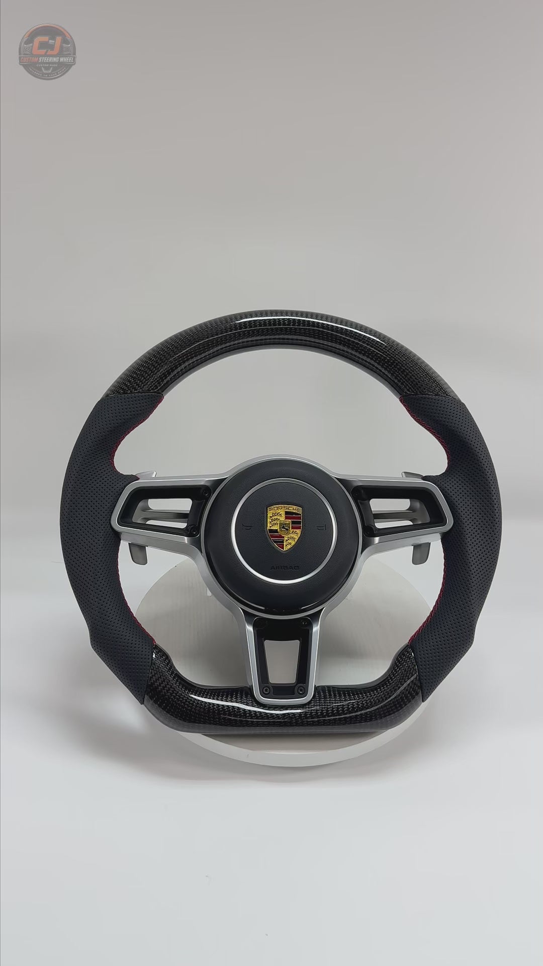 Porsche Custom Steering Wheel Video Displaying Carbon Fiber Top and Bottom Black Leather Grips Red Stitching Airbag Cover and Sport Paddle Shifters for 911 Carrera 996 997 918 Spyder CJ Mod Garage