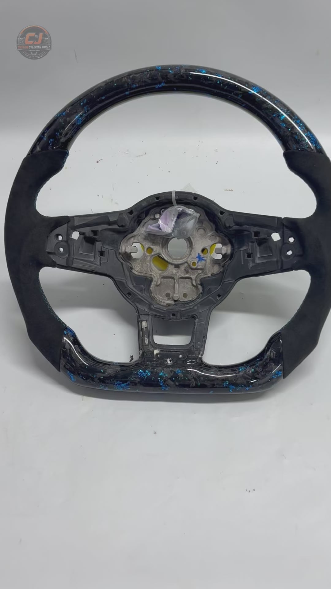 Volkswagen Golf GTI white background video showing blue forged carbon Alcantara wheel shell CJ Mod Garage