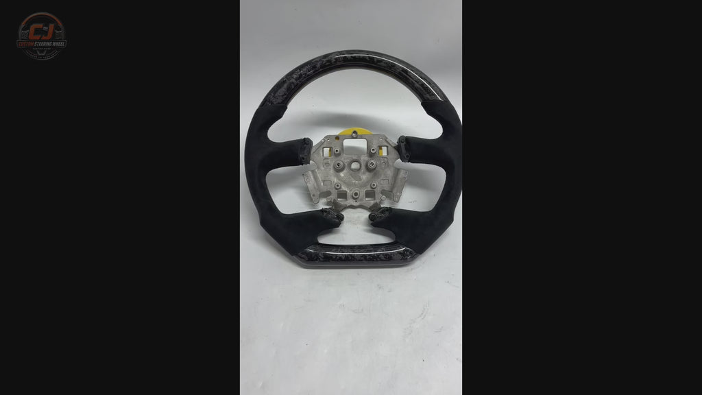 Ford Falcon FG XR XR6 XR8 custom steering wheel white background product video featuring forged carbon fiber and black Alcantara by CJ Mod Garage