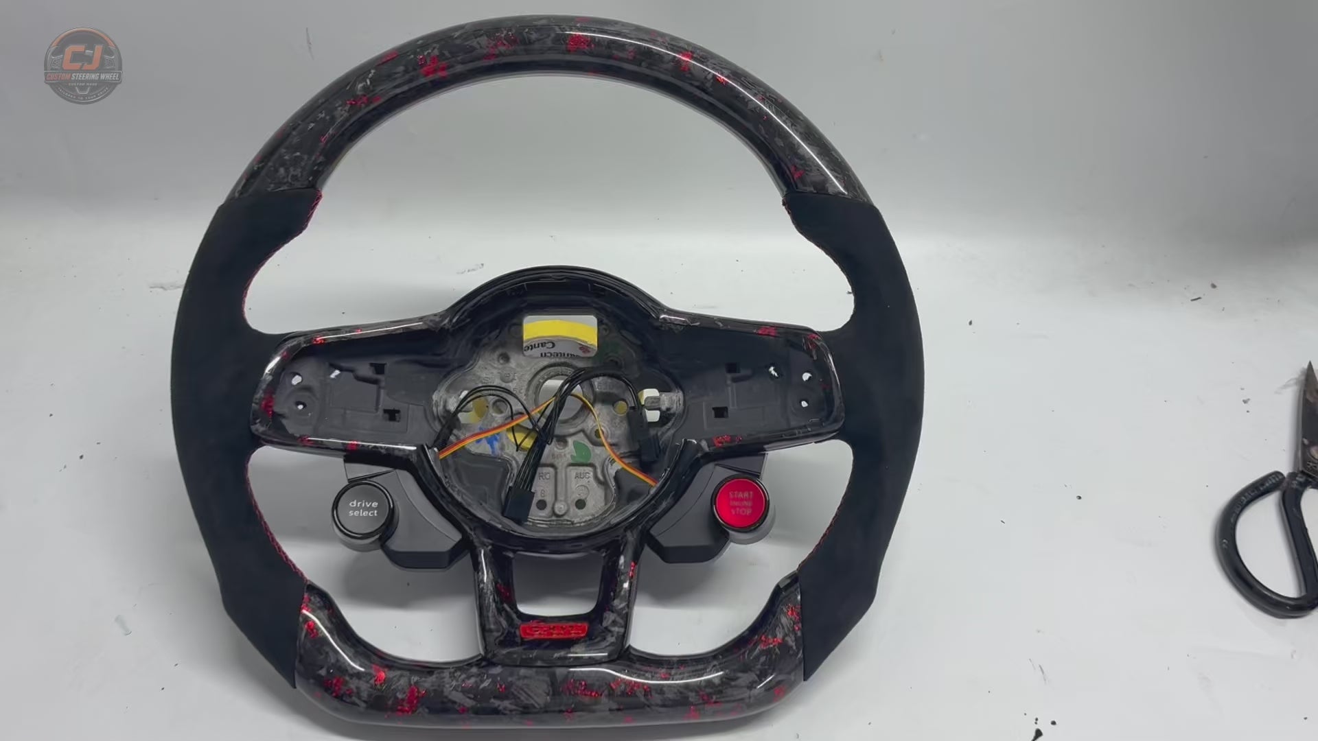 Volkswagen Golf GTI Mk7 2013 to 2020 white background product video showing red forged carbon suede grips CJ Mod Garage